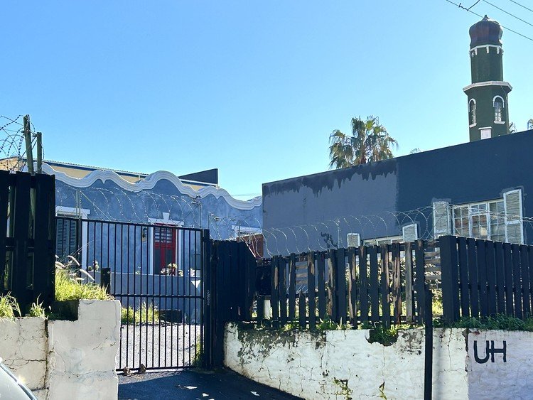 The historic Auwal Mosque within the contemporary Bo-Kaap streetscape