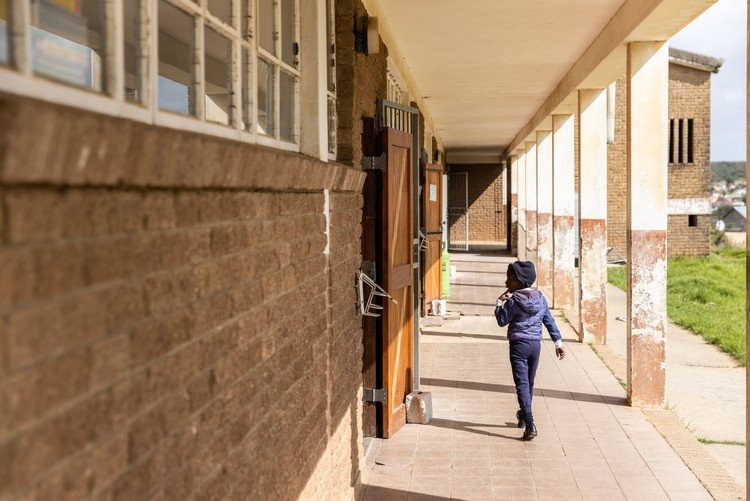A South African schoolchild in an everyday learning environment