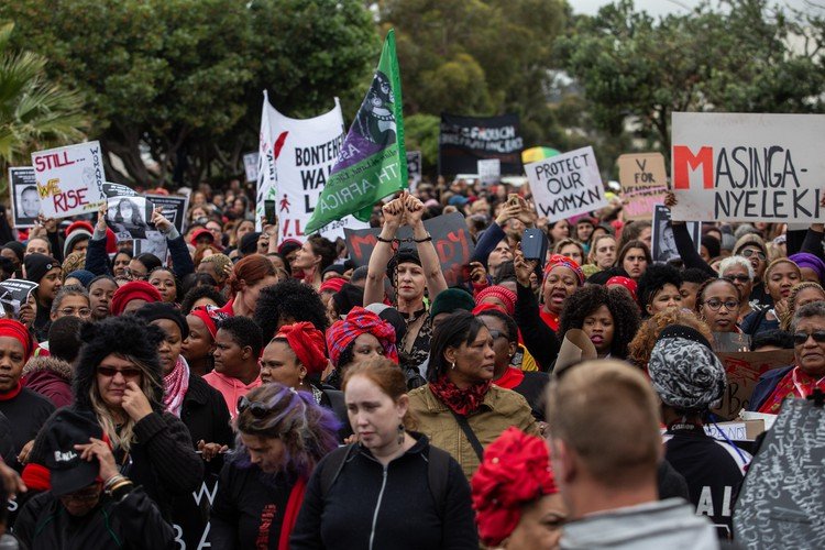 Women and supporters marching against gender-based violence